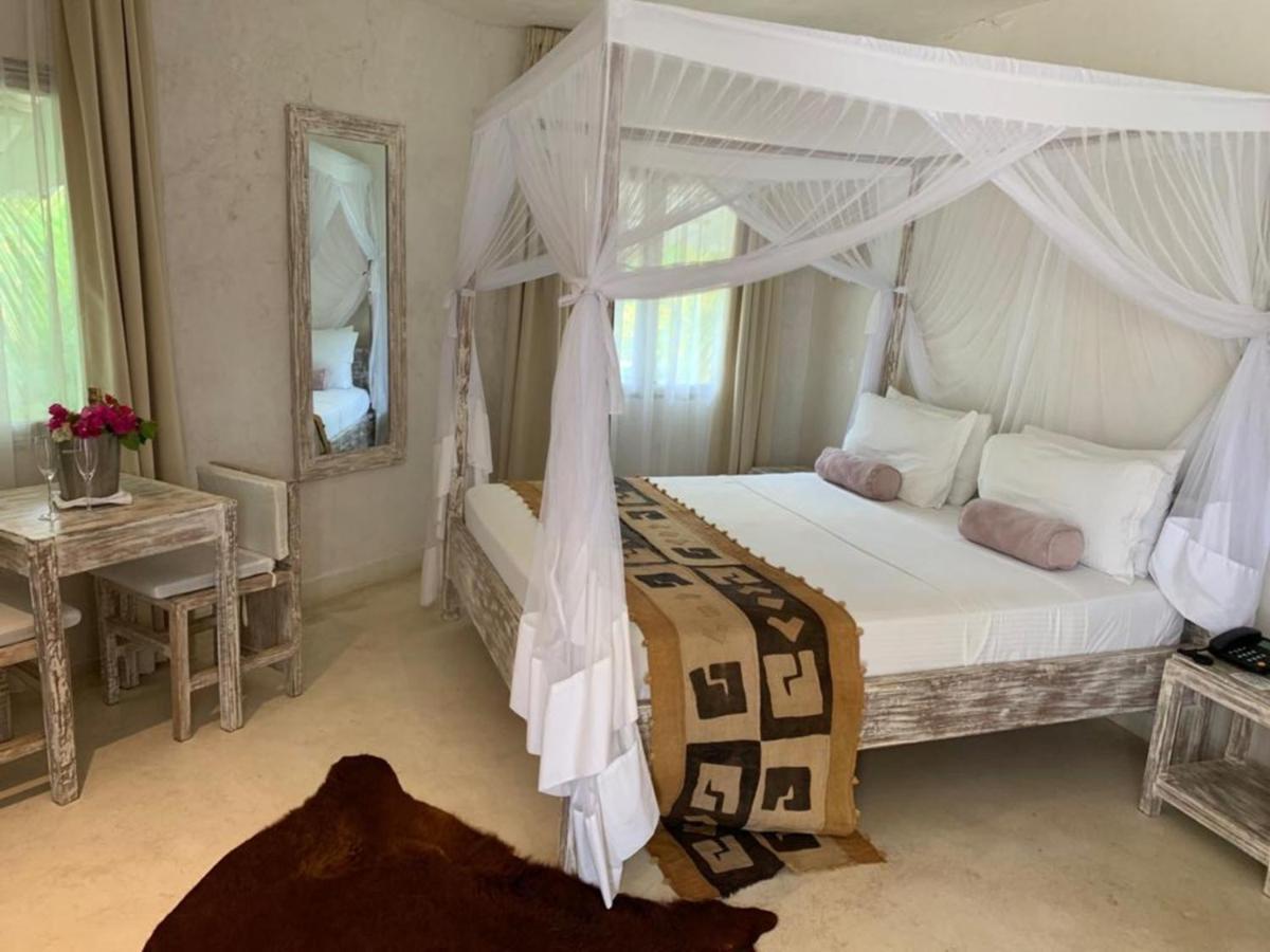 The Villa Luxury Suites Hotel Diani Beach Bagian luar foto